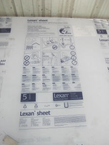 LOT PALLET W/ (6) 8' X 4' X 1/4" LEXAN PLASTIC TYPE MATERIAL SHEETS, OPTICALLY CLEAR, 9034 ULTRA MASKING BOTH SIDES GENERAL PURPOSE. LOW UV RESISTANCE & LOW ABRASION RESISTANCE (W-44) LOADING & HANDLING FEE $15-